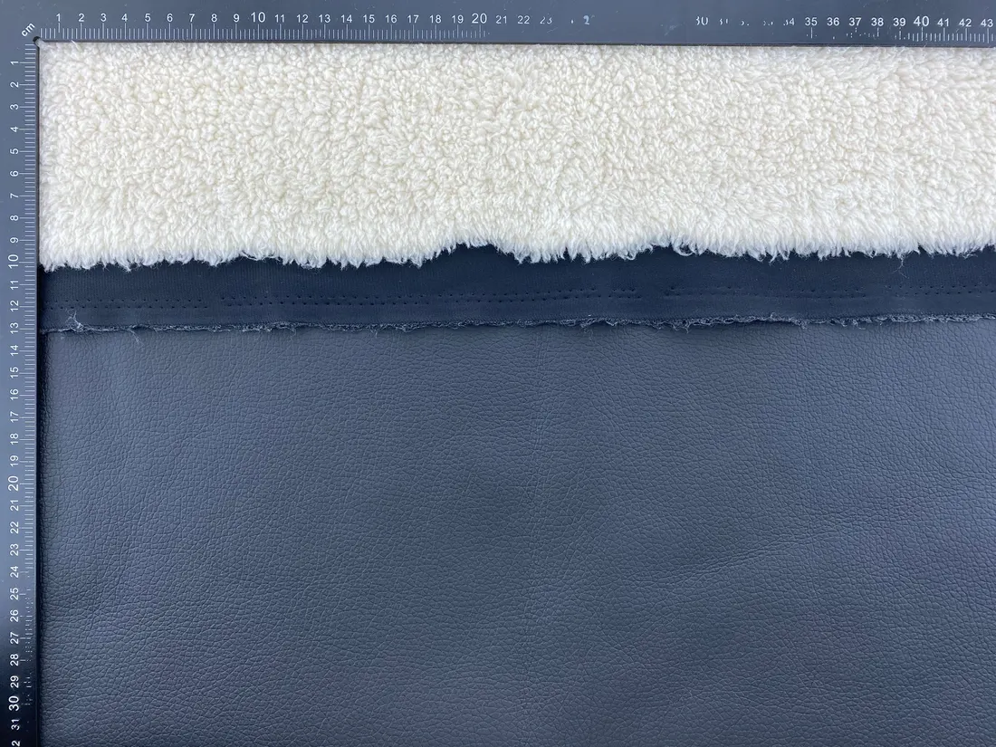 18117 Kumaş · İthal · Lez · Polyester · Poliüretan · Deri Kuzu Kürk · Siyah Deri · Krem Kürk · 150 Cm